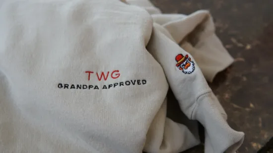 Chest and Wrist logo on sand sweater